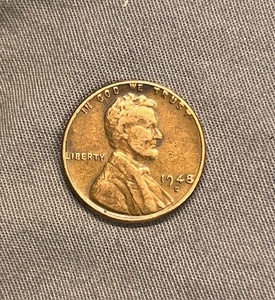lot 275 image: 1948 D Wheat Penny WRim Rolled L &amp Obverse Tilted Rim