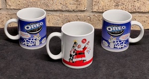 lot 298 image: Three (3) Collectible Mugs - Two (2) Oreo &amp One (1) Coca-Cola