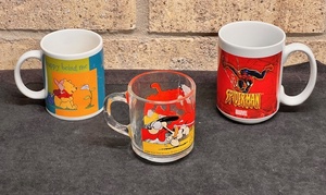 lot 293 image: Winnie the Pooh Happy Being Me, Spider-Man, &amp 1978 McDonalds Garfield Collectible Mugs