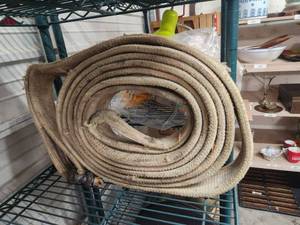 lot 96 image: Roll of tie down or pulling strap