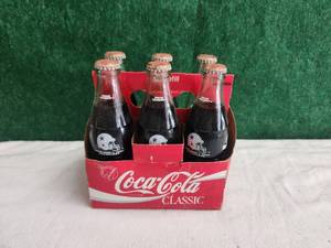 lot 117 image: Collectible 6-pack of Dallas Cowboy Coke bottles