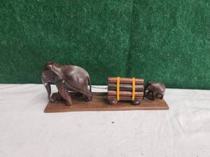lot 118 image: Wood elephant pulling cart and baby pushing
