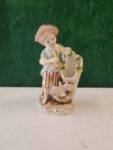 lot 203 image: Vintage porcelain Boy with horn vase figurine