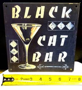 lot 10 image: METAL WALL HANGER FOR BLACK CAT BAR - 8 X 8
