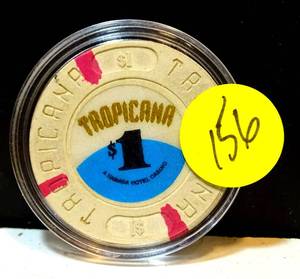 lot 156 image: COLLECTIBLE - $1 Casino Chip. Tropicana, Atlantic City, NJ.
