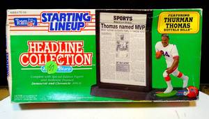 lot 157 image: 1992 Starting Lineup Thurman Thomas Headline Collection NFL Football