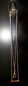 lot 251 image: SILVER FINISH NECKLACE CHAIN WITH CIRCLE AND BAR AS SHOWN