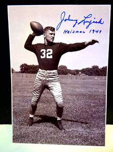 lot 282 image: AUTHENRIC HAND SIGNED HEISMAN TROPHY WINNER - JOHNNY LUJACK AUTOGRAPHED 5 X 7 PHOTO $$