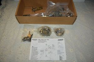 lot 11 image: Schlage F-series Parthenon x Georgian 2 pc Handleset Antique Brass