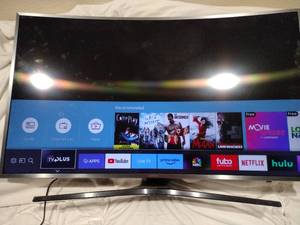 lot 40 image: Samsung Curved LED TV - model UN43KU7500FXZA