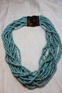 lot 56 image: Multi strand blue glass bead tribal or folk art necklace with wood clasp. 16L