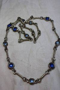lot 65 image: Gunmetal faceted glass disc matinee necklace with lobster clasp. 28L