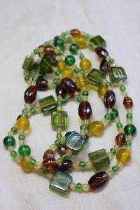 lot 66 image: Yellow, green and deep purple glass bead continuous rope necklace. 48L Beautiful colors