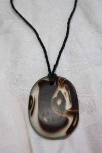 lot 73 image: Artisan crafted glass oval pendant (resembles Chocolate Agate) on leather cord necklace. 18L with 2 extender. Pendant 2L