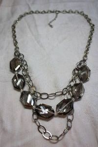 lot 78 image: Flat oval link silver finish necklace with faceted large smoky glass beads. 16L with 2 extender.