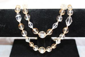 lot 87 image: Clear and champagne colored glass double strand necklace. 14L with 1 extender. Lobster clasp.
