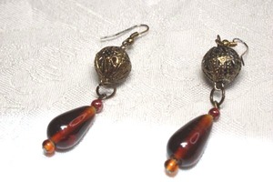 lot 92 image: Brown glass and brass French ear wire boho dangle earrings. 2.5L