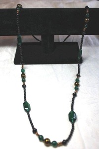 lot 95 image: Dark finish green and black glass bead necklace. 34L Lobster clasp.