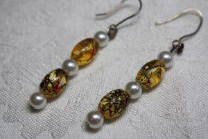 lot 100 image: Yellow graffiti glass and cultured pearl bead French ear wire dangle earrings. 2.5L