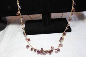 lot 102 image: Raspberry cuboid glass dangle gold cable chain necklace. 32L with 3 extender, Lobster clasp.