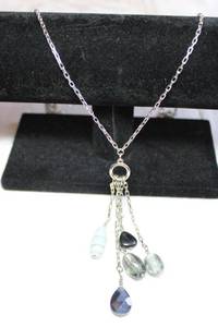 lot 109 image: Elongated rectangular link silver finish convertible necklace with glass tassel pendants. 32L Has toggle and bar to convert to double necklace.