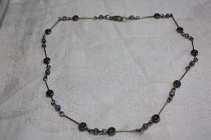 lot 110 image: Bezel set and round blue glass bead choker. Lobster clasp. 14L
