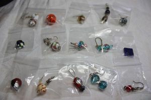 lot 150 image: Selection of VenetianCzech loose beads and single earrings including Venetian Wedding Cake beads plus.