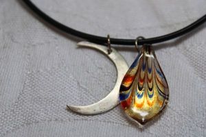 lot 156 image: Dichroic glass tear drop shape pendant with drawn colors on necklace. Lobster clasp. 16L. Pendant about 1L