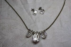 lot 129 image: Faceted prism drop glass pendant thread necklace with polished silver ball spacers. 16L Spring ring clasp. Includes a pair of cuboid AB glass block poststud earrings.
