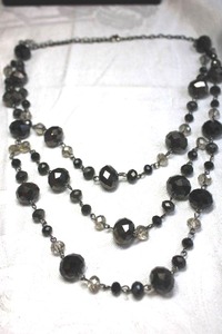 lot 182 image: Triple strand faceted black and clear glass station bead on metal chain necklace. 18L with 3 extender. Overall 22L