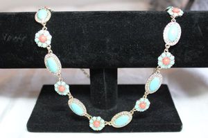 lot 197 image: Faux Turquoise and Coral blue and orange glass station necklace with gold finish chain yoke and rhinestone halos. Oversize spring ring clasp. Unique necklace. 20L
