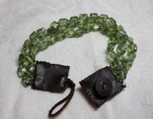 lot 206 image: Artisan crafted boho green glass bead bracelet with leather button clasp. 8L