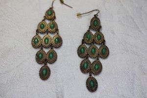 lot 209 image: Faceted green glass and bronze color metal chandelier ear wire earrings. 3.5L