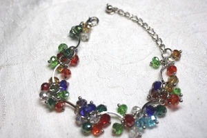 lot 217 image: Multi color faceted glass bead dangle bracelet, Lobster clasp. Adjustable from 6.5-8L