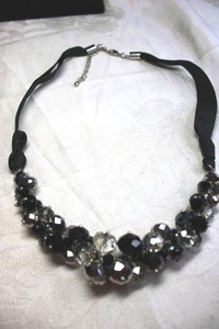 lot 228 image: Black and clear faceted bauble cluster necklace with satin fabric yoke. Lobster clasp. 18L with 3 extender
