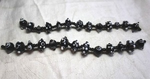 lot 242 image: (2) Black & White glass lampwork bead strings. Each 7L