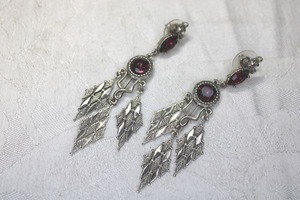 lot 247 image: Chandelier style purple glass and silver finish poststud earrings. 3L