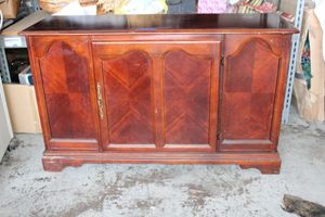 lot 45 image: Wood storage cabinet with center felt lined drawer as shown in photos.