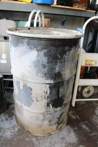 lot 43 image: Used Steel Drum Containment Barrel