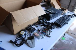 lot 258 image: Misc. Electronics and power cords Smartboard pens, Keyboards, Magnovox VHSDVD player, Corded computer mice