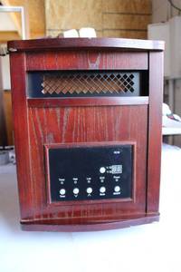 lot 262 image: Source Green Heat Portable Electric Heater on Wheels