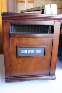 lot 263 image: Twin Star Movable Electric heater on Wheels