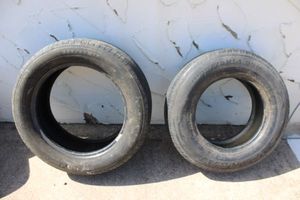 lot 269 image: 2 Used Tires. Michelin 235  55 R17 and SuperCat P195 75 R14. See photos