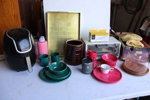 lot 279 image: Kitchen Lot Air Fryer, Toaster Oven, Plastic dishes, Glass dome platter, Ceramic jar and Keurig replacement water filter cartridges