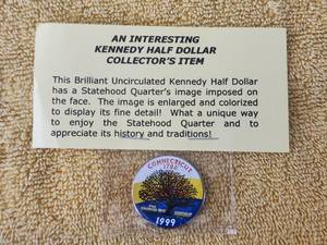 lot 82 image: 1999 - interesting Kennedy Half-Dollar collectors coin - statehood quarters image imposed on face