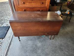 lot 72 image: Antique drop leaf walnut dining table