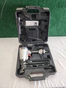 lot 94 image: Porter Cable air nail gun in case