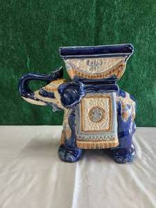lot 99 image: Ceramic elephant planter