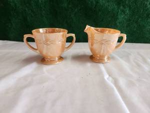 lot 203 image: Vintage Fire King peach laurel leaf creamer and sugar bowl set