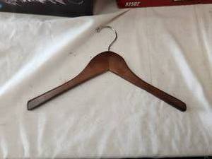lot 200 image: Generous selection of wooden hangers -